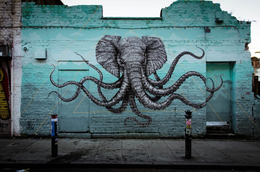 A large graffiti with an elephant with tentacles